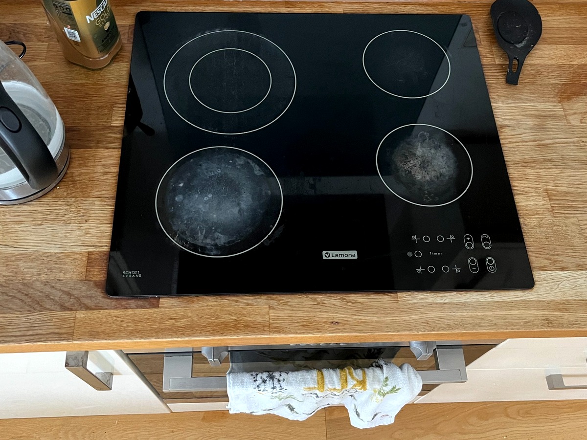 Faulty electric hob before same-day replacement at Albany Villas in Hove
