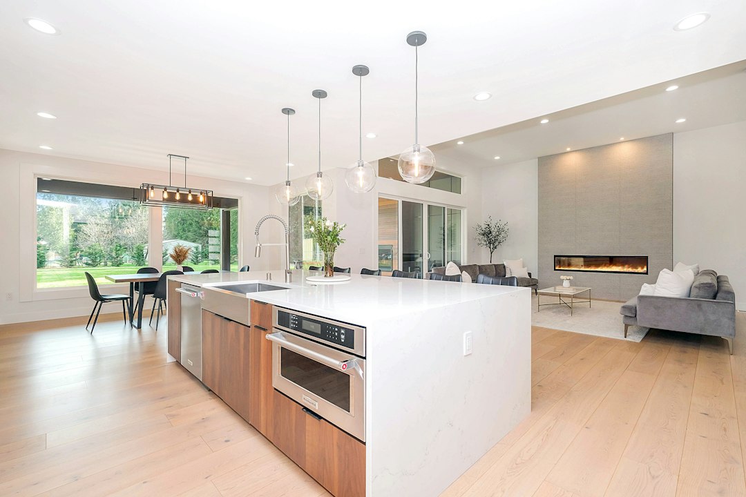 Modern fitted kitchen with worktops and lighting, illustrative stock photograph by Zac Gudakov on Unsplash
